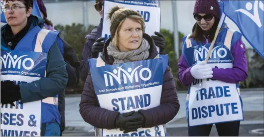  ??  ?? Nurses – not those quoted on this page – on strike outside Bray Health Centre last Thursday.