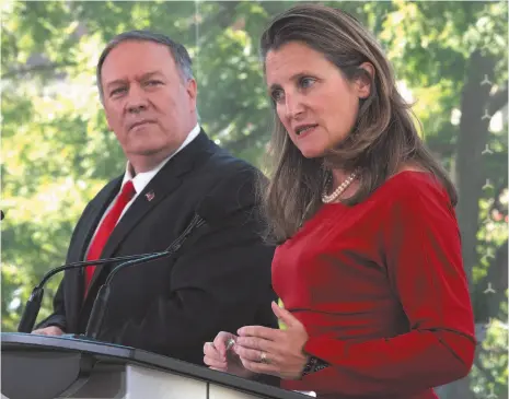  ?? CP PHOTO ?? US Secretary of State Mike Pompeo looks on as Canadian Foreign Affairs Minister Chrystia Freeland responds to a question Thursday during a joint news conference in Ottawa.