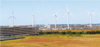  ?? WAYNE PARRY AP FILE ?? Windmills at a utility plant in Atlantic City, N.J. New Jersey committed itself in November to building a transmissi­on system capable of handling enough offshore wind energy to power 3.2 million homes.