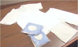  ?? AP ?? This photo taken from a video provided by the Church of Jesus Christ of Latter-day Saints shows the "temple garment,” a white cotton undergarme­nt worn by church members.