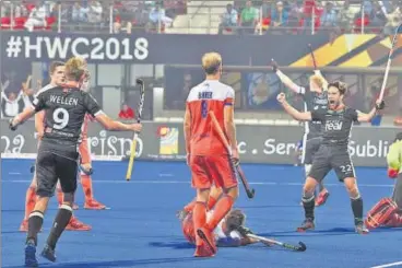  ?? ARABINDA MAHAPATRA/HT PHOTO ?? Germany’s Marco Miltkau (right) exults after scoring against the Netherland­s on Wednesday.