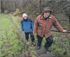  ?? Photograph: Iain Ferguson, alba.photos ?? Ken Johnston, left, and Mark Linfield explore the 1980s path which they hope to extend.