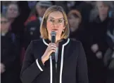  ?? CARL COURT, GETTY IMAGES ?? “We need to make sure that our intelligen­ce services have the ability to get into encrypted services,” says British Home Secretary Amber Rudd, shown Thursday during a candleligh­t vigil in Trafalgar Square.