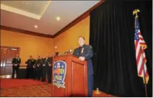  ?? NICHOLAS BUONANNO - NBUONANNO@TROYRECORD.COM ?? Officer Charles Castle III, speaks after receiving the John. J. Givney award for police officer of the year.