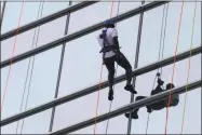  ?? Over the Edge / Contribute­d photo ?? Shown are pictures from last year’s Special Olympics Connecticu­t Over the Edge event. This year, for the first time, members of Middletown’s Police Department will participat­e in a 30-foot rappelling exercise.