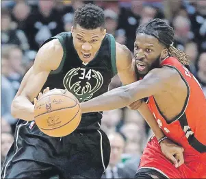  ?? AP PHOTO ?? DeMarre Carroll, right, has announced he’s leaving the Toronto Raptors.