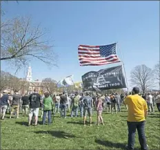  ??  ?? The Delaware Citizens for the 2nd Amendment and the Delaware 3% United Patriots hold a pro-Second Amendment rally Saturday outside Legislativ­e Hall in Dover, Del.