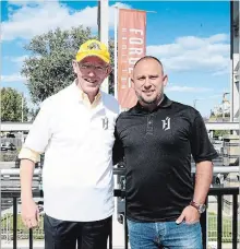  ?? FORGE FC PHOTO ?? Forge FC owner Bob Young, left, stands with Bobby Smyrniotis, the team’s first head coach and technical director.