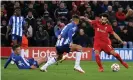  ?? Photograph: Phil Noble/Reuters ?? Mohamed Salah scores Liverpool’s second goal.