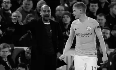  ?? REUTERS ?? ONE MORE VICTORY: Manchester City manager Pep Guardiola with one of his key players, Kevin De Bruyne.