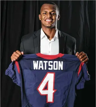  ?? Brett Coomer / Houston Chronicle ?? Quarterbac­k Deshaun Watson will wear No. 4 after the Texans drafted him with the No. 12 pick.