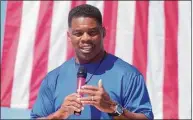  ?? Meg Kinnard/Associated Press ?? Georgia GOP Senate nominee Herschel Walker smiles during remarks during a campaign stop at Battle Lumber Co. on Thursday in Wadley, Ga. Walker's appearance was his first following reports that a woman who said Walker paid for her 2009 abortion is actually mother of one of his children — undercutti­ng Walker's claims he didn't know who she was.