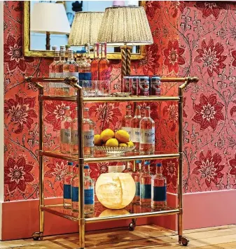  ??  ?? Solid brass: Soane Britain’s Nureyev Trolley is a classic look. Below, a two-tiered trolley from the Blanchard Collective with large front wheels