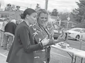  ?? HALEY BEMILLER/COLUMBUS DISPATCH ?? U.S. Senate candidate Morgan Harper participat­es in a Facebook Live video with Jennifer Rieser-braunm at Jordan’s Crossing Resource Center in Columbus on March 30.