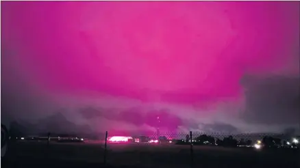  ?? Picture: PAUL CARRACHER ?? PINK SKY AT NIGHT: Low moisture-laden clouds across the Wimmera last week turned a dramatic pink overnight in Horsham’s west. The strange phenomenon was caused by illuminati­ng lamps in new hothouses at Grains Innovation Park.