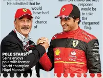  ?? ?? POLE STARS Sainz enjoys pole with former World champion Nigel Mansell