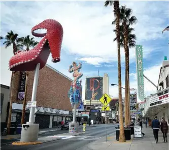  ??  ?? “Old” Vegas boasts some new attraction­s and lower prices from the Strip. Travelers on a budget can still indulge in the city — if they know where to look.