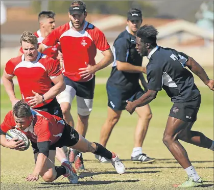  ?? Picture: GALLO IMAGES ?? ON THE ROLL: Ball carrier Schalk Ferreira, seen in action with Chris Cloete during the Southern Kings’ training session, is hoping to see his side emerge victorious against the Bulls on Saturday