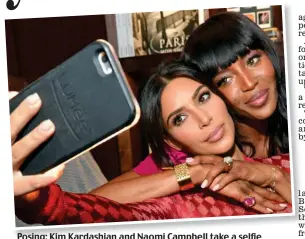  ??  ?? Posing: Kim Kardashian and Naomi Campbell take a selfie