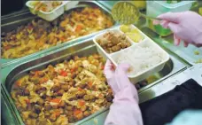  ?? PHOTOS PROVIDED TO CHINA DAILY ?? Top: Volunteers at Food Angel’s Sham Shui Po kitchen trim edible surplus vegetables that would otherwise have been dumped in landfills. Above:A senior enjoys her free lunch at Food Angel’s community center in Sham Shui Po. Left: Food Angel turns edible surplus food into nourishing hot meals. PHOTOS BY EDMOND TANG /Right from top: A CHINA DAILY shabby wash basin in a subdivided flat; an elderly member of Food Angel’s community center lives in a tiny subdivided flat.