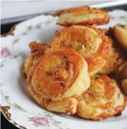  ?? PHOTOS BY GRETCHEN MCKAY/PITTSBURGH POST-GAZETTE/TNS ?? Quick and super-easy, these cheese and bacon pinwheels are made with puff pastry dough.