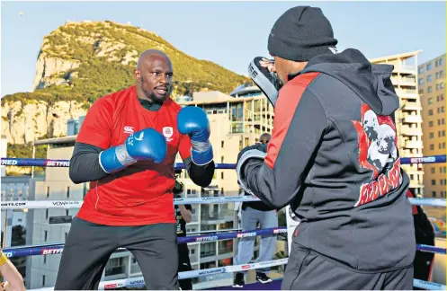  ??  ?? Ready to rock: Dillian Whyte works out in Gibraltar ahead of his fight with Alexander Povetkin (left)