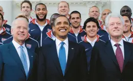  ?? SUSAN WALSH/AP 2010 ?? Then-president Barack Obama, flanked by then-vice President Joe Biden and former President Bill Clinton, stand with the U.S. soccer team at the White House.