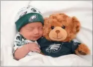  ?? SUBMITTED PHOTO ?? Mason Bloomer wears an Eagles cap after being born nine months after the Eagles won the Super Bowl.