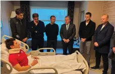  ?? Reuters ?? Turkey’s Minister of Youth and Sports Osman Askin Bak visits referee Halil Umut Meler in hospital in Ankara