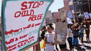  ?? | COURTNEY AFRICA African News Agency (ANA) ?? CHILDREN from Clarke Estate in Elsies River picket against violence and abuse perpetrate­d against them. This is in reaction to the kidnapping and murder of 8-year-old Tazne van Wyk of Ravensmead.