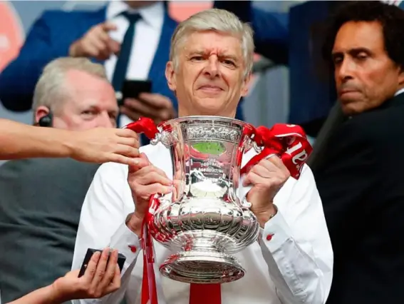  ??  ?? Arsène Wenger ended a difficult season with a moment of happiness (Getty)