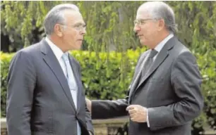  ?? EFE ?? Fainé, presidente de la Fundación La Caixa, y Brufau, presidente de Repsol