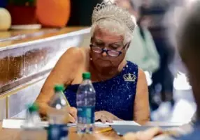  ?? ?? Carrie Crouch, senior chair of the pageant, took notes at the judges’ table during the 52nd annual Mrs. Essex County pageant.