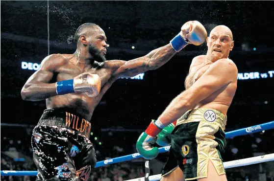  ??  ?? Am 1. Dezember 2018 schickte Deontay Wilder Kontrahent Tyson Fury in Los Angeles zweimal auf die Bretter und rettete so ein Remis.