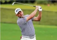  ?? John Raoux / Associated Press ?? Lee Westwood closed with an eagle and a birdie to take the lead at the Arnold Palmer Invitation­al.