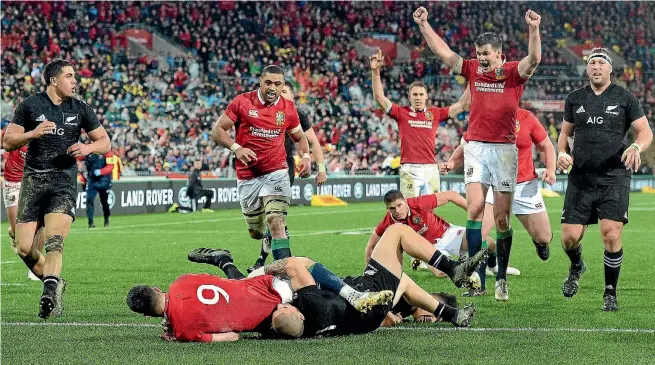  ?? PHOTO: PHOTOSPORT ?? British and Irish Lions halfback Conor Murray scores the second-half try that was pivotal in the tourists’ late comeback to beat the All Blacks in the second test.