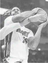  ?? JEFFREY PHELPS/AP ?? Heat forward James Johnson believes the hop is finally back in his step.