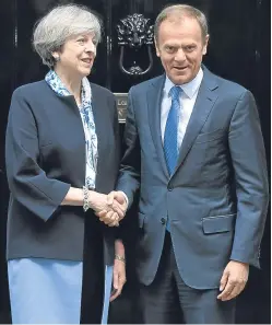  ?? Picture: PA. ?? It’s sweetness and light now between Theresa May and European Council president Donald Tusk but how long will that stay the case through the Brexit talks?