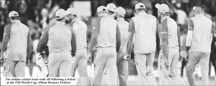  ?? ?? The Indian cricket team walk off following a defeat at the T20 World Cup. (Photo Reuters Twitter)