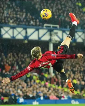  ?? (AP Photo/Jon Super) ?? Manchester United's Alejandro Garnacho scores his side's first goal during the English Premier League soccer match between Everton and Manchester United, at Goodison Park Stadium, in Liverpool, England, Sunday , Nov. 26, 2023.