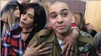  ?? PICTURE: EPA ?? Israeli soldier Elor Azaria is embraced by his mother.