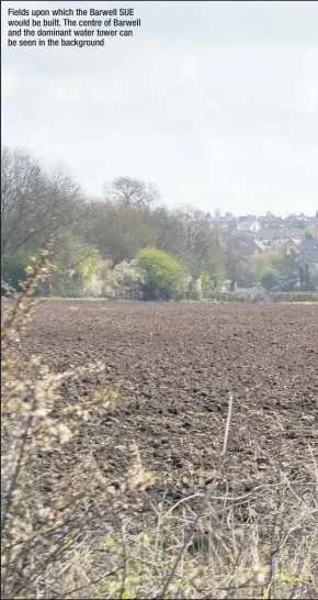  ??  ?? Fields upon which the Barwell SUE would be built. The centre of Barwell and the dominant water tower can be seen in the background