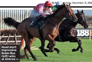  ?? PA ?? Head start: impressive Robin Roe (left) wins at Aintree