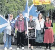  ??  ?? FreedomMem­bers of YES Scotland, including Councillor Christine Deanie (second right) attend the annual Wallace Day rally in Elderslie
