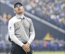  ?? PETER MORRISON / ASSOCIATED PRESS ?? Amissed putt onNo. 17 in the playoffhur­t LouisOosth­uizen on Monday. The SouthAfric­an has nowbeen a runner-up in three majors.