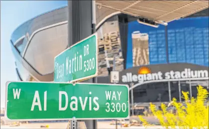  ?? Benjamin Hager Las Vegas Review-journal @benjaminhp­hoto ?? The sign for Al Davis Way, named for the former Raiders owner and coach, recently went up near Allegiant Stadium at Dean Martin Drive.