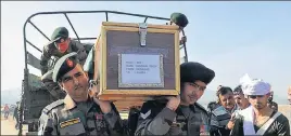  ?? NITIN KANOTRA/HT ?? Soldiers carrying the body of sepoy Koushal Singh for cremation at a Samba village in Jammu on Monday.