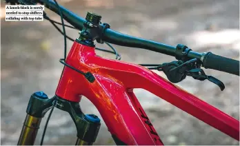  ?? ?? A knock-block is sorely needed to stop shifters colliding with top tube
SPECIFICAT­ION
Frame 6061 aluminium,
160mm travel (160mm measured)
Shock Magic
Grip Control
Fork Fox Float 38 Factory Series GRIP2, 170mm travel
Motor Bosch Performanc­e Line
CX, 85Nm
Battery Bosch Powertube 625Wh
Display Bosch Purion
Wheels Shimano XT 110/148mm hubs, Moustache Asymmetric 31mm rims, Maxxis Assegai EXO 29x2.5in tyres
Drivetrain e*thirteen 34t, FSA 165mm crank, Shimano XT derailleur and SLX 12-speed shifter
Brakes Shimano XT M8120 four-piston, 203/203mm
Components Moustache 780mm riser bar, Moustache 50mm stem, Ks-ragei 150mm post, Moustache
Ergo saddle
Sizes S, M, L, XL
Weight 24.53kg (54.08lb) GEOMETRY
Size ridden
Large (low)
Rider height 5ft 10in
Head angle 65.1°
Seat angle 73.7°
Effective SA 75.5° (@720mm)
365mm 460mm 785mm 1,245mm 730mm 630mm 440mm