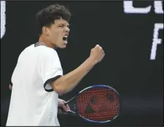  ?? Associated Press ?? Ben Shelton, of the US, reacts during his fourth-round match against compatriot J.J. Wolf on Monday at the Australian Open tennis championsh­ip in Melbourne, Australia. Shelton won 6-7 (5), 6-2, 6-7 (4), 7-6 (4), 6-2 to become one of three American men to make the quarterfin­als.