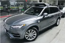  ?? ERIC RISBERG/THE ASSOCIATED PRESS/FILES ?? Uber has stopped testing autonomous vehicles in Arizona, California, Pittsburgh and Toronto.